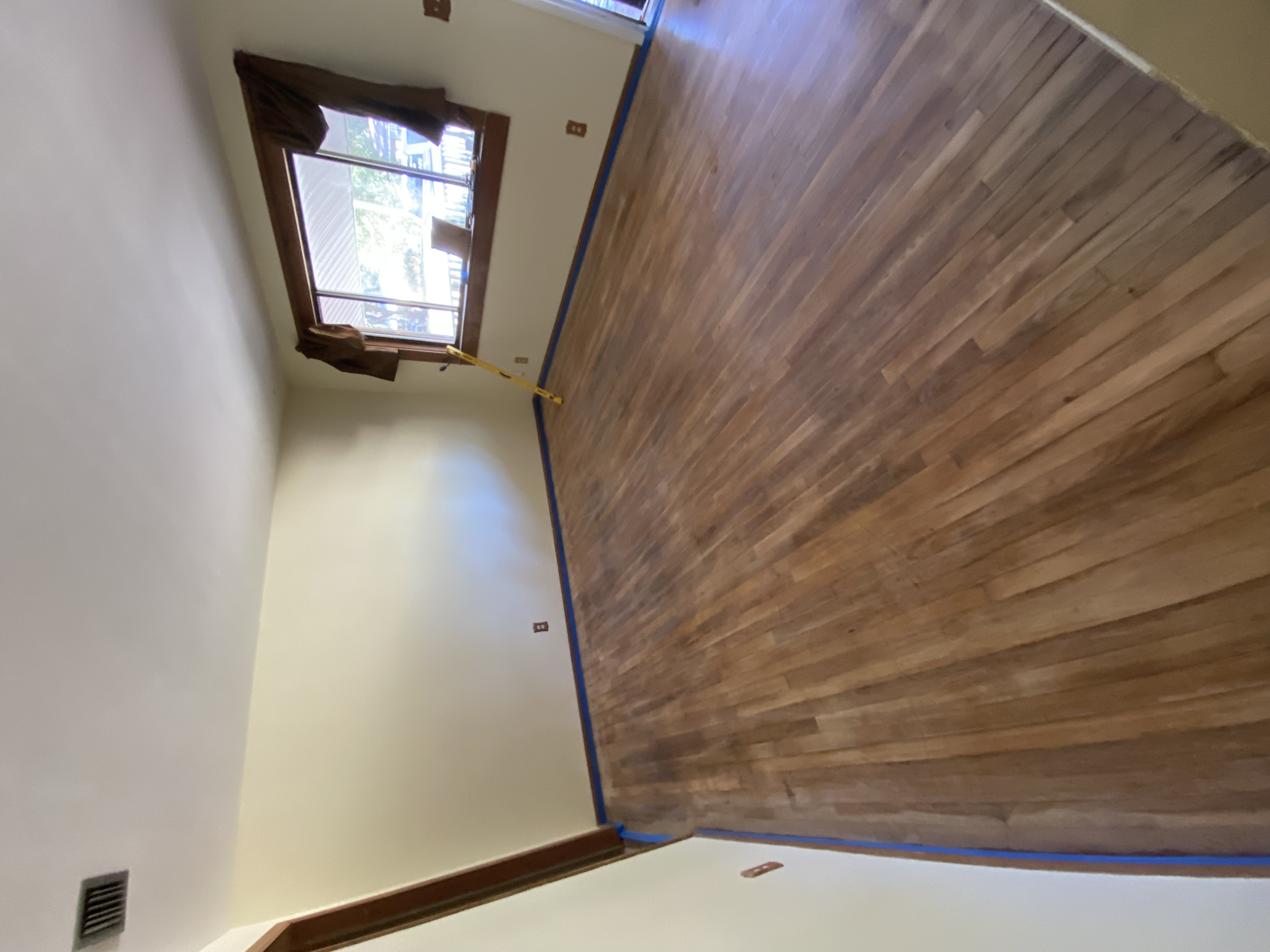 Hardwood floor before — sanded raw