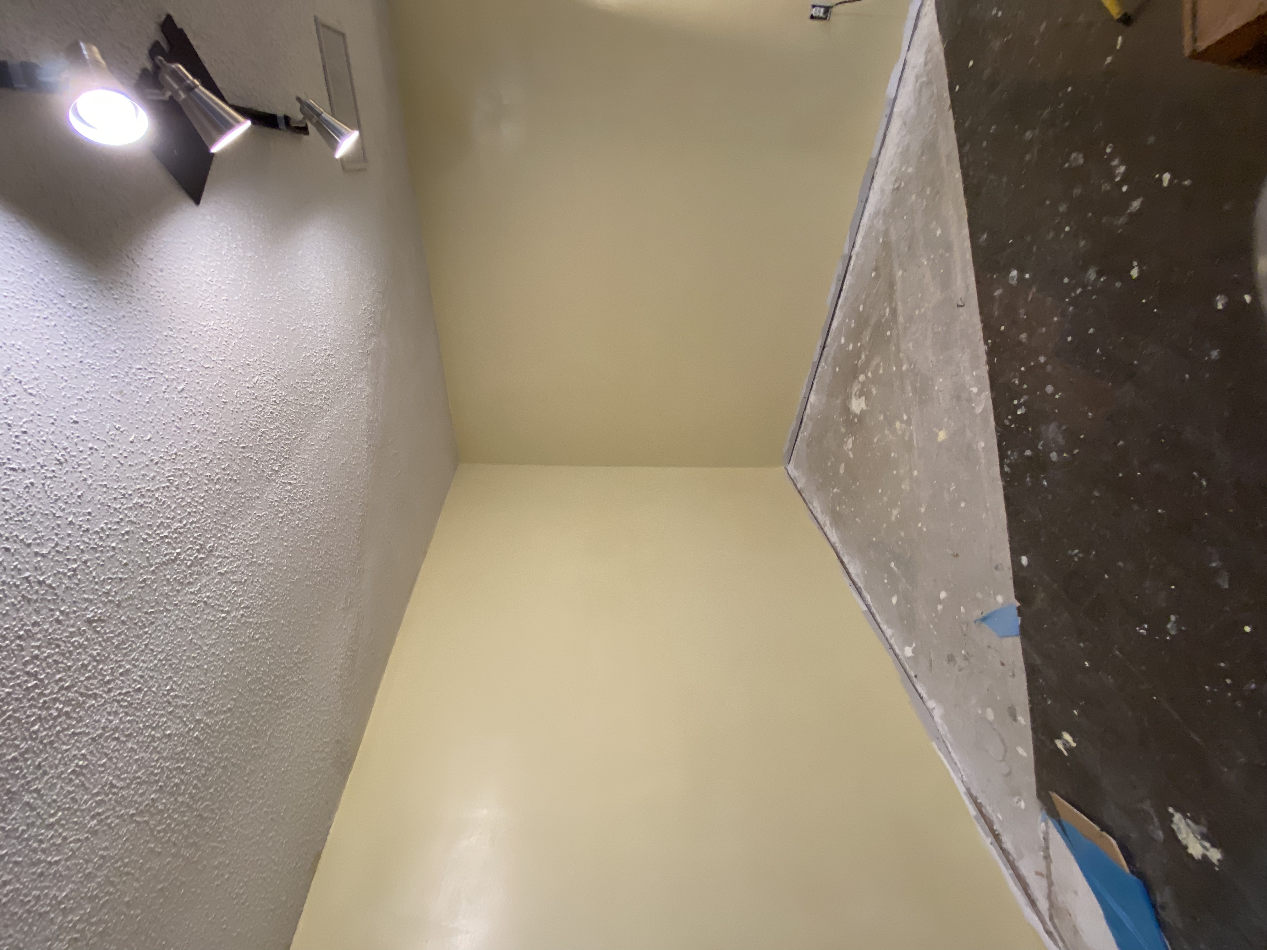 Finished room with new drywall and refinished hardwood floor